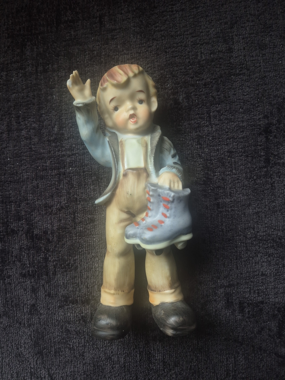 Porcelain Figurine Boy Holding Ice Skates - Blue Jacket, Tan Pants
